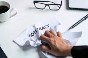 business-woman-tearing-contract-her-office-breaking-contract-concept_44943-1071